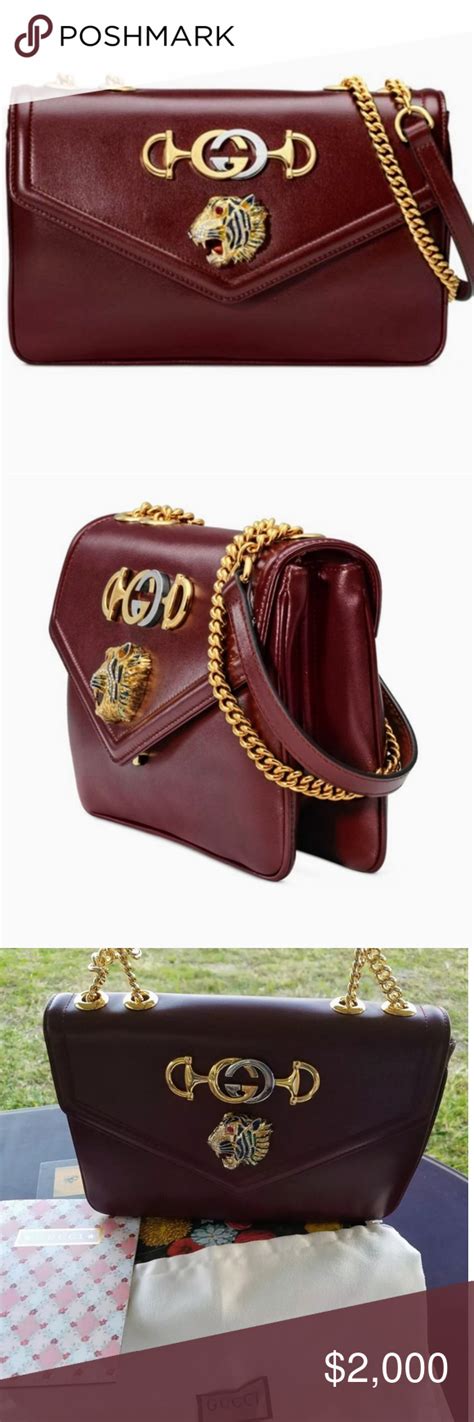 rajah gucci bag|Gucci burgundy rajah clutch bag.